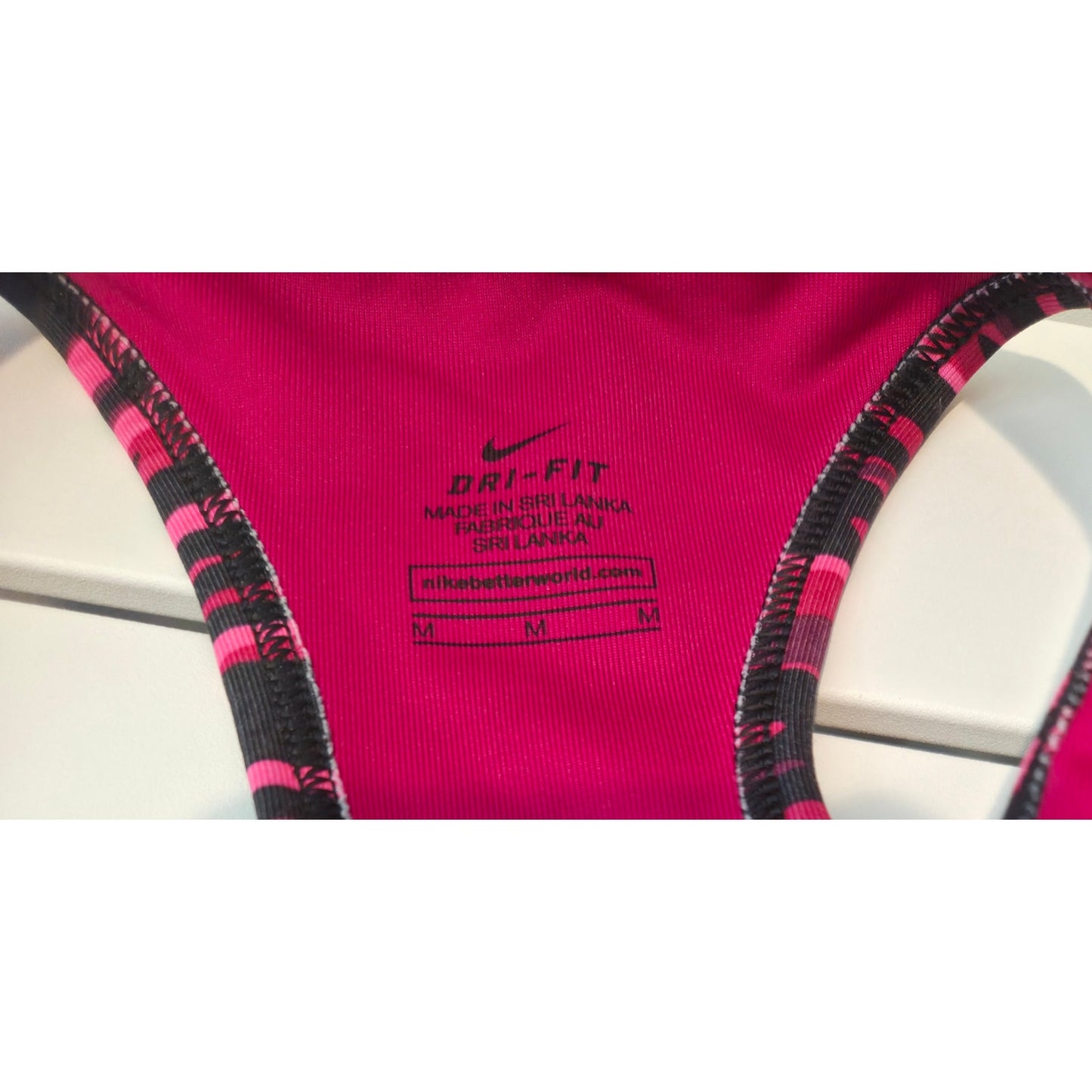 Nike Dri-FIT Polyester Racerback Sports Bra Moisture Wicking Pink Geo Print Sz M